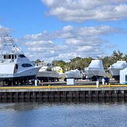 Boats, whose owners are not planning to use them for a while, are wrapped