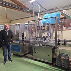 Die Flaschen-Wasch-Abfüll-Etikettiermaschine