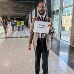 Case. He met me at the airport. He was helping two Italians when I met him. He speaks 6 languages