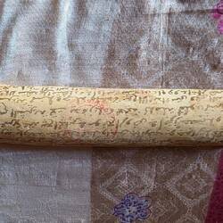 A contract written on a piece of wood.