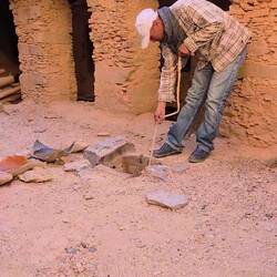 Drawing water from the well in the interior.
