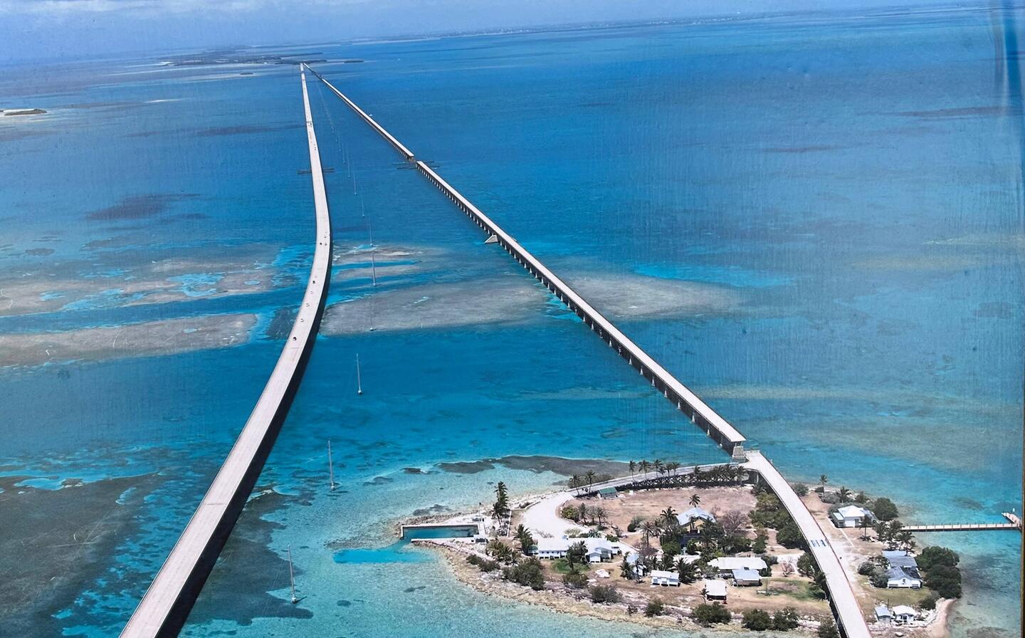 The famed '7-mile Bridge'. Old rail bridge (later highway bridge) on the right. New hwy at left.