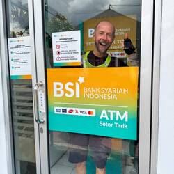 An ATM kiosk. They are often air conditioned and great for a cool off!