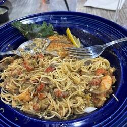 Redfish special topped with shrimp and crawfish. That's how much I took home!