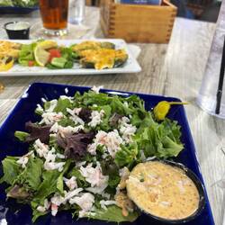Jalepeno crab stuffed appetizer with crab side salad