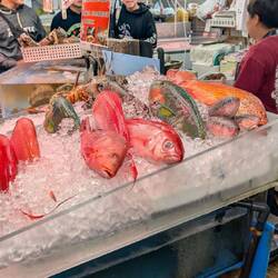 Naha's seafood market. Order downstairs and they cook it at a restaurant upstairs.
