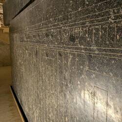 Inscriptions on the side of the sarcophagus