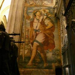 Vast 30 high mural of St Christopher, carrying the Christ child, just next to Chris Columbus's tomb