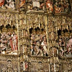 The altarpiece shows many scenes from the life of Jesus