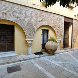The column capitals are mostly reused Roman stones