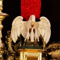 Detail on Cristo del Amor, a pelican sharing its flesh with its young, symbol of the Eucharist