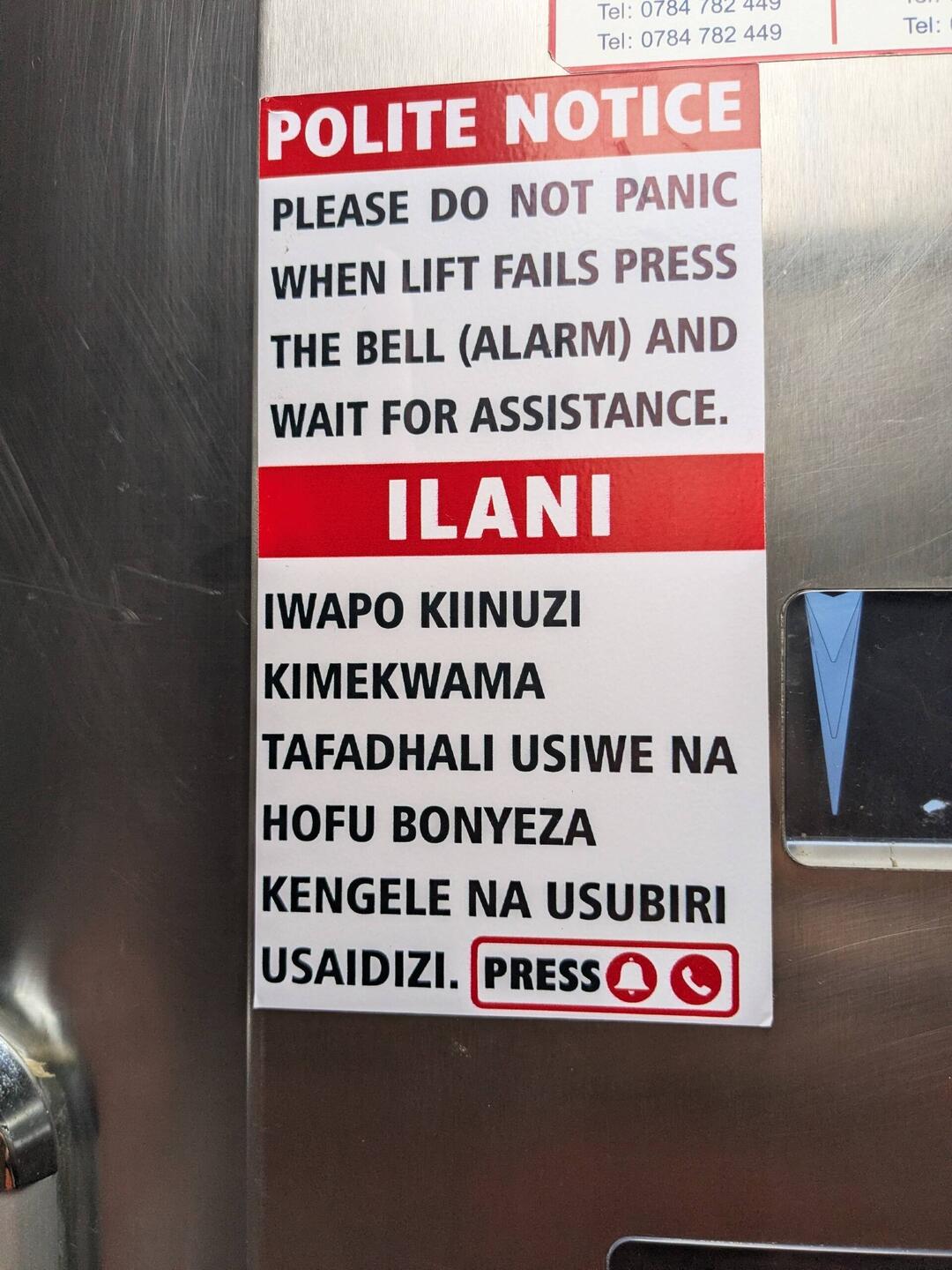 Sign in the small hotel elevator