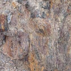 The road has cut through the volcanic rock