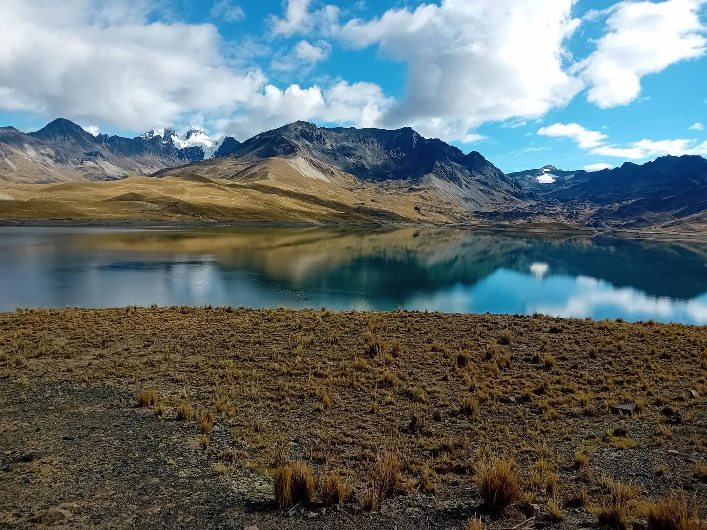 Lago Tuni, reflecting Condoriri on the left, Cerro Zongo Jisthaña on the right.
