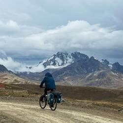 The peaks play in the clouds and we suffer in the dust