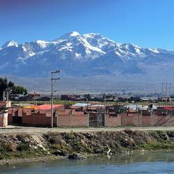 Paradox of natural grandor and human mediocrity.