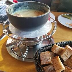 This is classic fondue with bacon and Grindelwald bread, I am fond. (The bag contained potatoes)