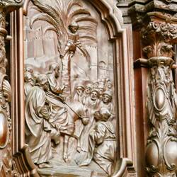 Many biblical scenes are carved into the choir panelling