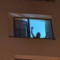 Waving to Lee in the Courtyard