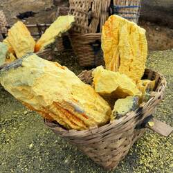It's all about this. Sulphur. Mt Ijen is where it is mined. It comes out orange and turns yellow.