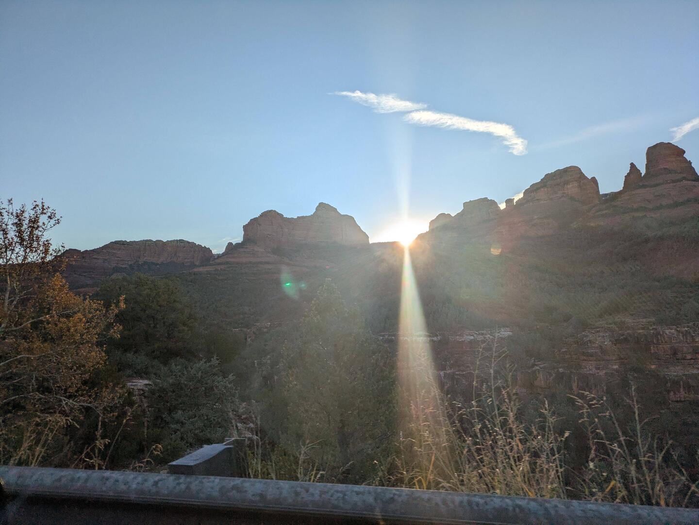 Last bits of sunrise behind the mountains in Oak Creek Canyon.