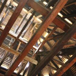 Hip roof structure in the last addition. St. Nick is said to hide up here till the big day.