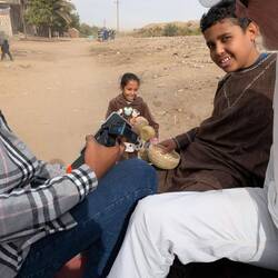 She was running behind our Tuk Tuk trying to sell us baskets