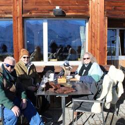 If you can believe it, sitting outside on fleeces enjoying hot chocolate. We got rid of coats.