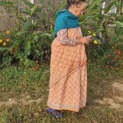 Amma, the proprietors Mother who is left in charge.