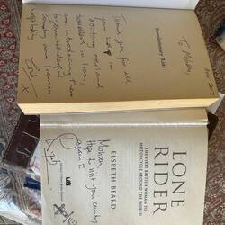 Signed books copies by badass female motorcyclists.