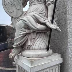 ATHENA-This sword kept getting stolen so in was buried thru the statue in the ground 10'