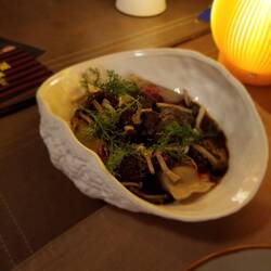 Ragout of Austrian deer with mushrooms and ravioli.