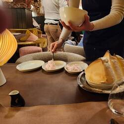 Salzburger nockeral being served up, first is the cherry cream.