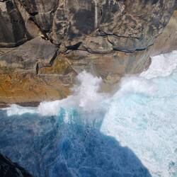 Waves smashing into the gap