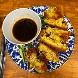 We love this snack: Martabak Kentang (IDR 22,700, £1) - egg, potato, carrot: fried