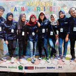 Eight students “had a creative idea to turn the slum into a place full of colour and life”