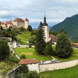 Panoramic view ... including the château, church, and Dent du Broc & Dent du Chamois — Gruyères.