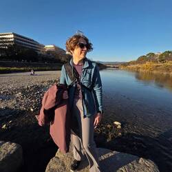 Lynette imitating stupid influencer pictures looking wistfully into the distance