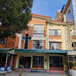 Nehemiah building, built by Koreans, where Sarju has an office.