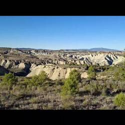 Vidéo-diaporama retour par les badlands au soleil descendant