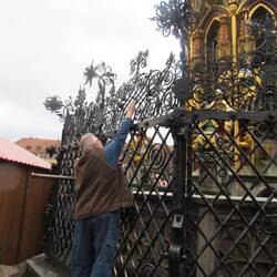 So the apprentice stayed up all night fashioning a brass ring in the ironwork.