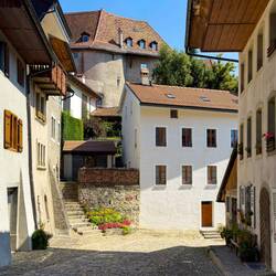 Charming streetscape on a quiet morning — Gruyères, Switzerland.