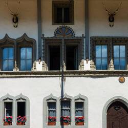 One of several houses on Rue de Bourg — Gruyères, Switzerland.