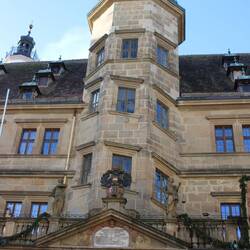 The windows spiral up with the stairs.