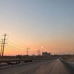 Afternoon on the road, passing by a refinery. Fuel is so cheap here...