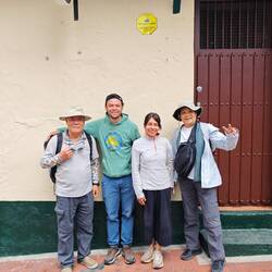 Man and woman in the middle had won best tasting coffee competition before