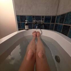 Before the bath anxiety set in. Note soap that should not be in the bath.