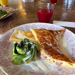 Amazing breakfast crepe with the cute avocado rose
