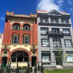 A pair of Insurance Buildings from a bygone era