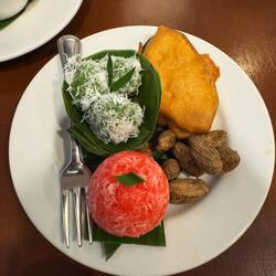 Chewy, gloopy flavoured rice balls, fried bananas and nuts for 'afternoon tea'